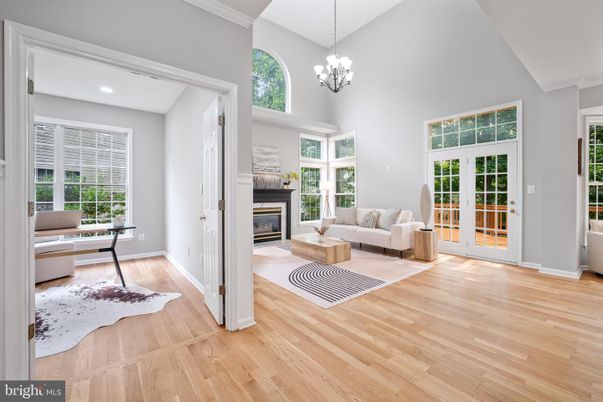 Chandelier, Fireplace, Home Office, Interior, Living room, Recessed Lighting, Wood Texture Flooring