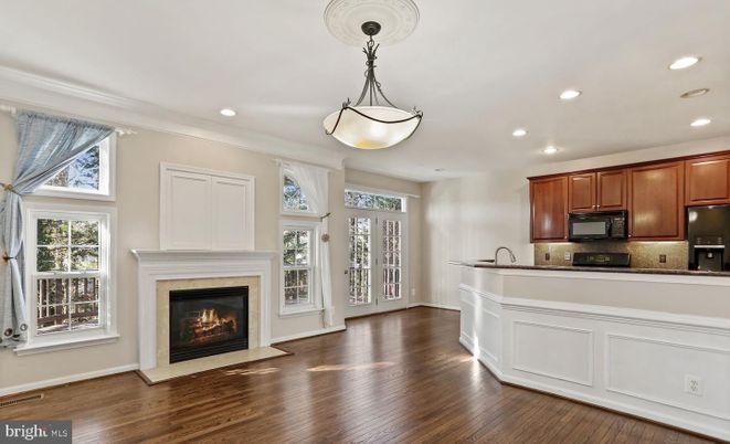 Fireplace, Interior, Kitchen, Pendant Lights, Recessed Lighting, Stainless Steel Appliances, Wood Texture Flooring