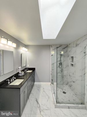 Bathroom, Dual Sink Vanities, Glass Shower, Interior, Marble, Marble Walls