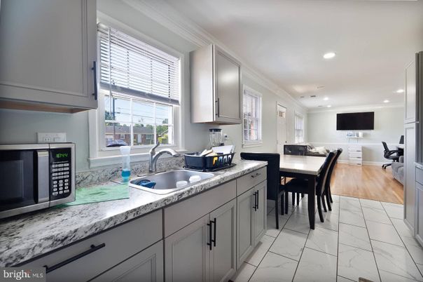 Dining room, Interior, Kitchen, Living room, Marble, Recessed Lighting, Wood Texture Flooring