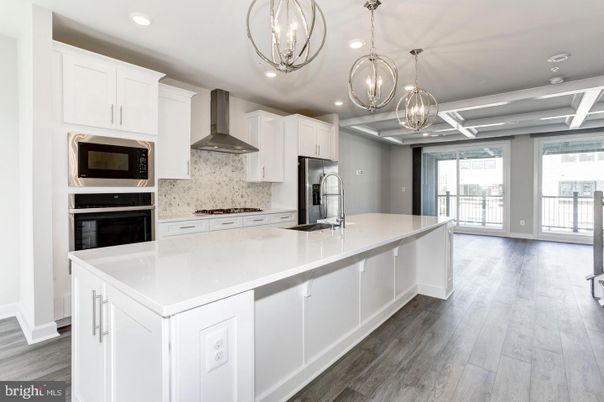 Chandelier, Interior, Kitchen, Pendant Lights, Recessed Lighting, Stainless Steel Appliances, Wood Texture Flooring