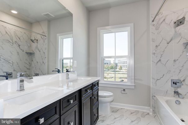 Bathroom, Dual Sink Vanities, Interior, Marble, Marble Walls, Recessed Lighting