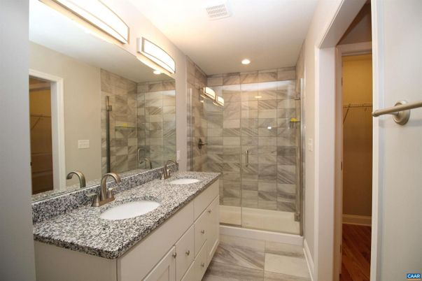 Bathroom, Dual Sink Vanities, Glass Shower, Interior, Marble, Recessed Lighting