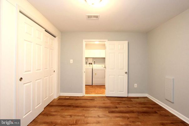 Empty room, Interior, Utility Closets, Washer, Wood Texture Flooring