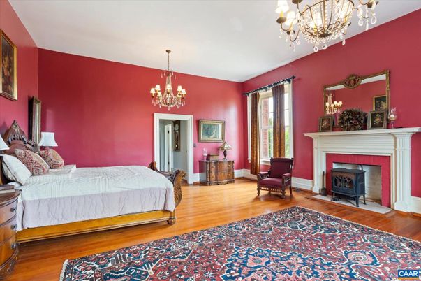 Bedroom, Chandelier, Fireplace, Interior, Wood Texture Flooring