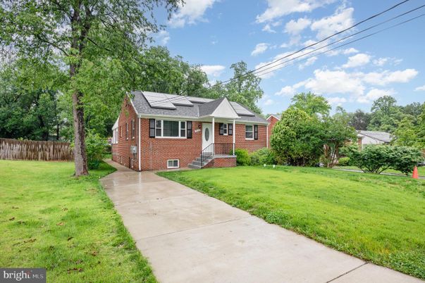 Backyard, Exterior, Facade, Brick Facade, Solar Panels, Cape Cod