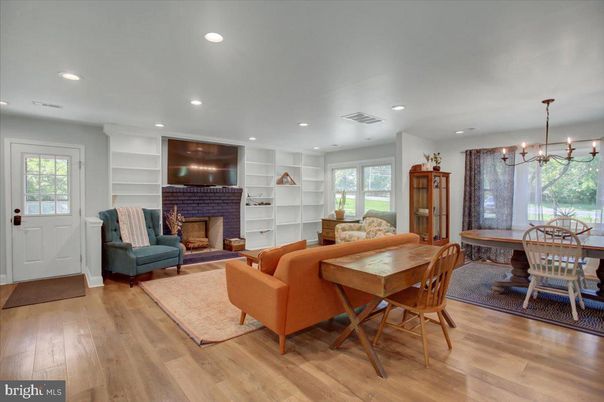 Dining room, Fireplace, Interior, Living room, Pendant Lights, Recessed Lighting, Wood Texture Flooring