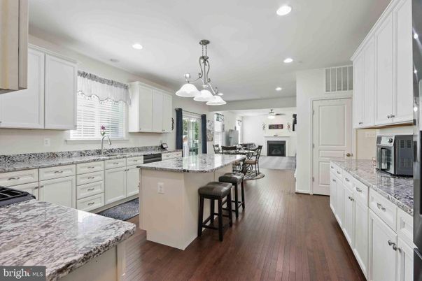 Fireplace, Interior, Kitchen, Pendant Lights, Recessed Lighting, Wood Texture Flooring