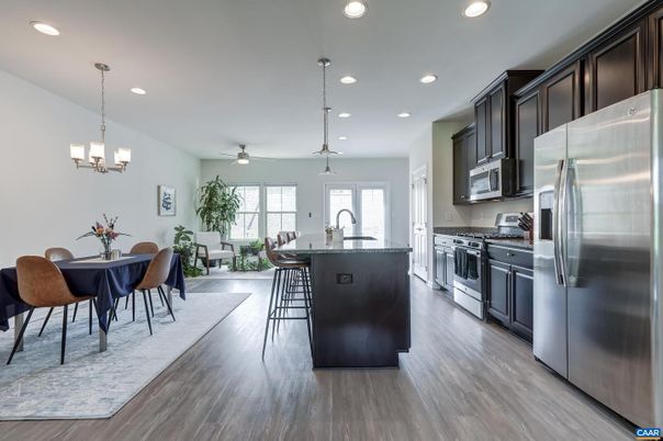 Chandelier, Dining room, Interior, Kitchen, Pendant Lights, Recessed Lighting, Stainless Steel Appliances, Wood Texture Flooring