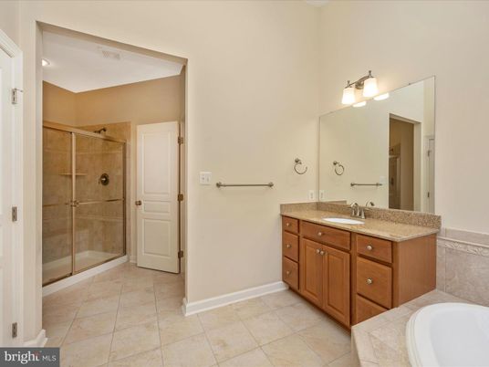 Bathroom, Dual Sink Vanities, Glass Shower, Interior, Recessed Lighting, Tile Countertops