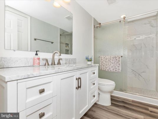 Bathroom, Glass Shower, Interior, Marble Walls, Wood Texture Flooring