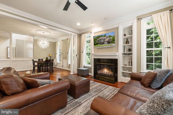 Chandelier, Dining room, Fireplace, Interior, Living room, Recessed Lighting, Wood Texture Flooring