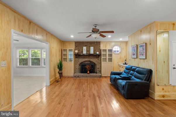 Fireplace, Interior, Recessed Lighting, Stone Walls, Wood Texture Flooring, Wooden Walls