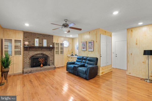 Fireplace, Interior, Recessed Lighting, Stone Walls, Wood Texture Flooring, Wooden Walls