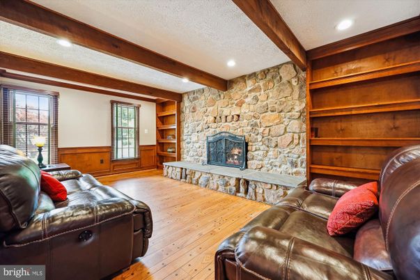 Fireplace, Interior, Living room, Recessed Lighting, Stone Walls, Wooden Beams, Wood Texture Flooring