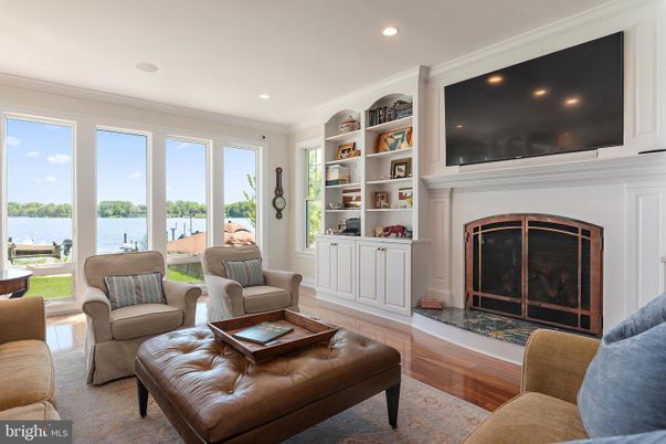 Fireplace, Interior, Living room, Recessed Lighting, Water, Wood Texture Flooring