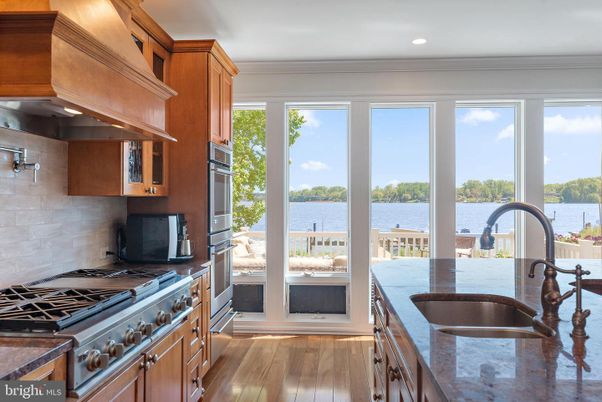 Interior, Kitchen, Recessed Lighting, Stainless Steel Appliances, Water, Wood Texture Flooring