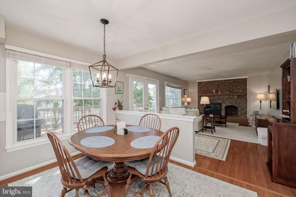 Dining room, Fireplace, Interior, Living room, Pendant Lights, Stone Walls, Wood Texture Flooring