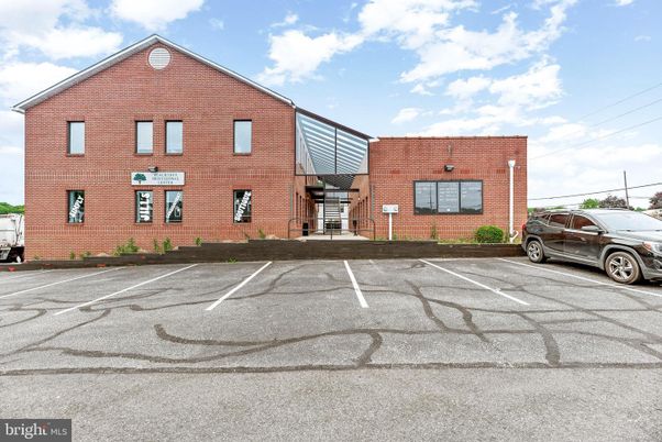 Exterior, Facade, Brick Facade, Condo Building