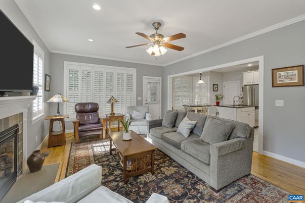 Fireplace, Interior, Kitchen, Living room, Pendant Lights, Recessed Lighting, Stainless Steel Appliances, Wood Texture Flooring