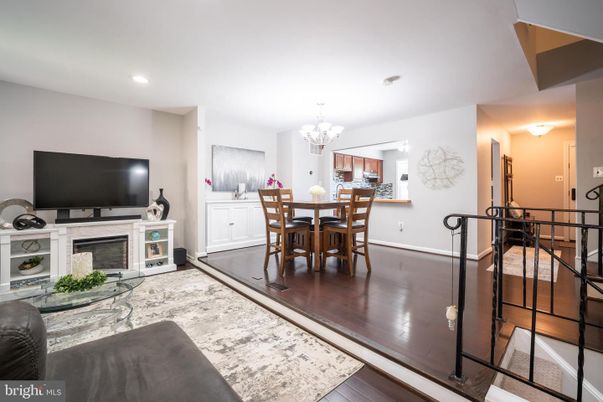 Chandelier, Dining room, Fireplace, Interior, Recessed Lighting, Wood Texture Flooring