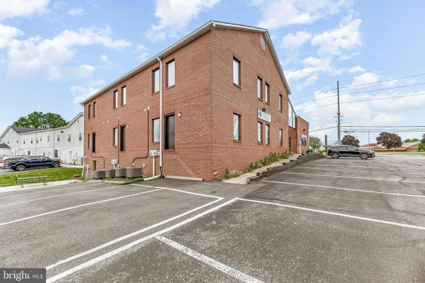Exterior, Facade, Brick Facade, Condo Building