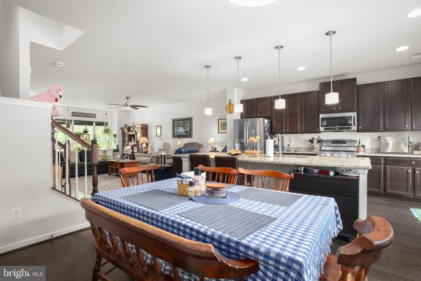 Dining room, Interior, Kitchen, Living room, Pendant Lights, Recessed Lighting, Stainless Steel Appliances, Wood Texture Flooring
