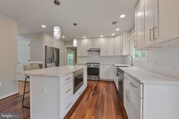 Interior, Kitchen, Pendant Lights, Recessed Lighting, Stainless Steel Appliances, Wood Texture Flooring