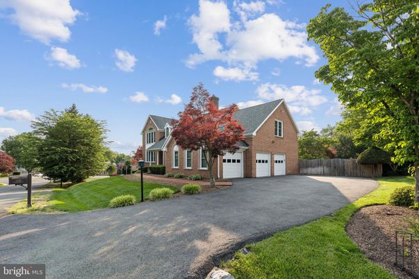 Attached, Backyard, Exterior, Facade, Brick Facade, Tudor Revival