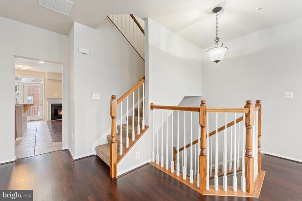 Fireplace, Interior, Pendant Lights, Recessed Lighting, Wood Texture Flooring