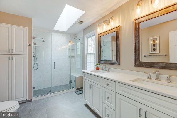 Bathroom, Dual Sink Vanities, Glass Shower, Interior, Marble Walls