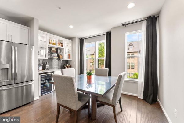 Dining room, Interior, Kitchen, Recessed Lighting, Stainless Steel Appliances, Wood Texture Flooring