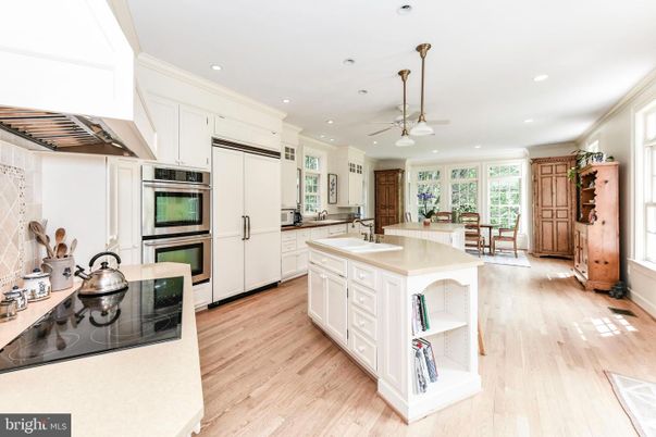 Dining room, Interior, Kitchen, Recessed Lighting, Stainless Steel Appliances, Wood Texture Flooring