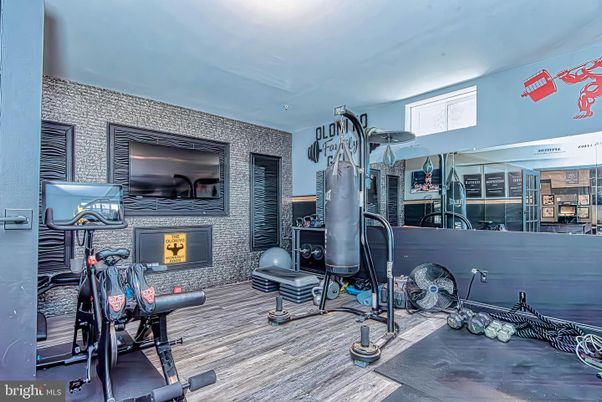 Fireplace, Fitness Equipment, Interior, Wood Texture Flooring