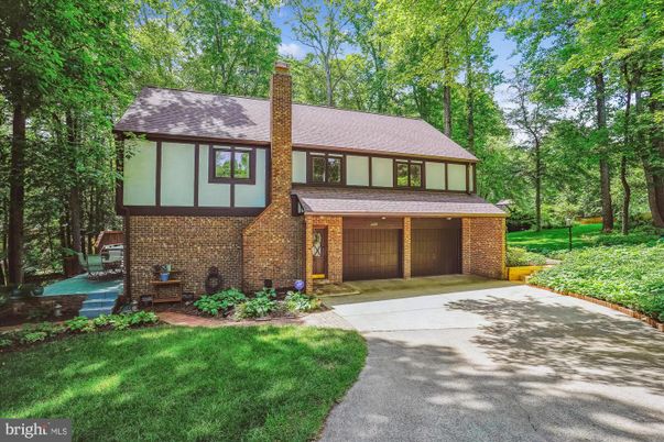 Attached, Backyard, Exterior, Facade, Brick Facade, Tudor Revival