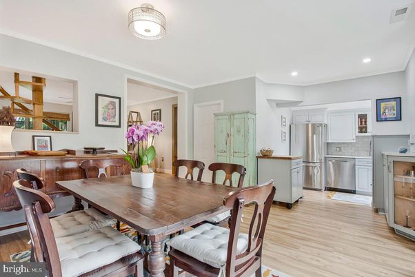 Dining room, Interior, Kitchen, Recessed Lighting, Stainless Steel Appliances, Wood Texture Flooring