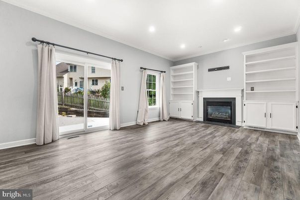 Empty room, Fireplace, Interior, Recessed Lighting, Wood Texture Flooring