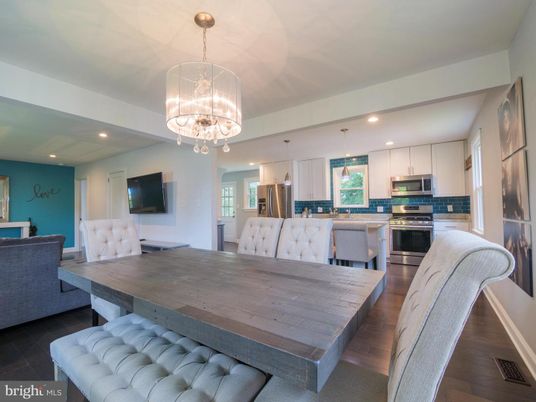 Chandelier, Dining room, Interior, Kitchen, Pendant Lights, Recessed Lighting, Stainless Steel Appliances, Wood Texture Flooring