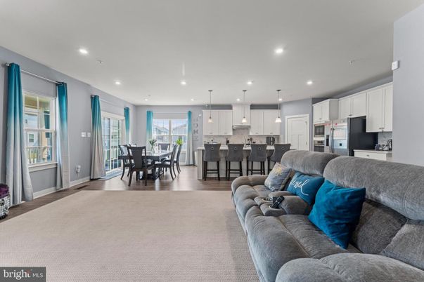 Dining room, Interior, Kitchen, Living room, Pendant Lights, Recessed Lighting, Stainless Steel Appliances, Wood Texture Flooring