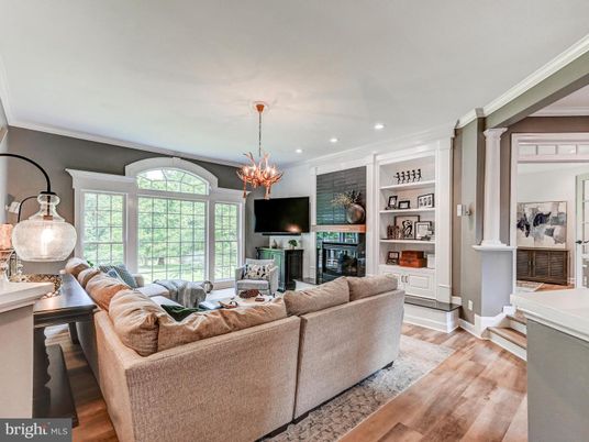 Chandelier, Fireplace, Interior, Living room, Recessed Lighting, Wood Texture Flooring