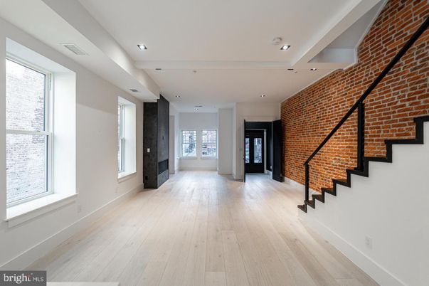 Empty room, Interior, Recessed Lighting, Stone Walls, Wood Texture Flooring