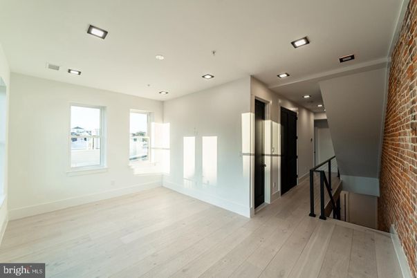 Empty room, Interior, Recessed Lighting, Stone Walls, Wood Texture Flooring