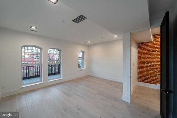 Empty room, Interior, Recessed Lighting, Stone Walls, Wood Texture Flooring