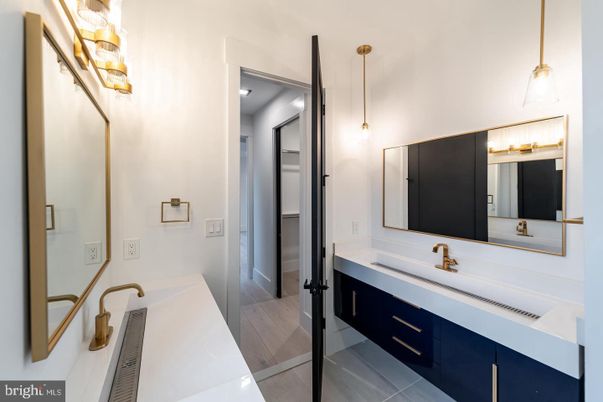 Bathroom, Dual Sink Vanities, Interior, Pendant Lights, Wood Texture Flooring