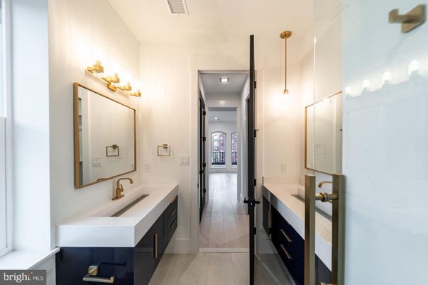 Bathroom, Dual Sink Vanities, Interior, Recessed Lighting, Wood Texture Flooring