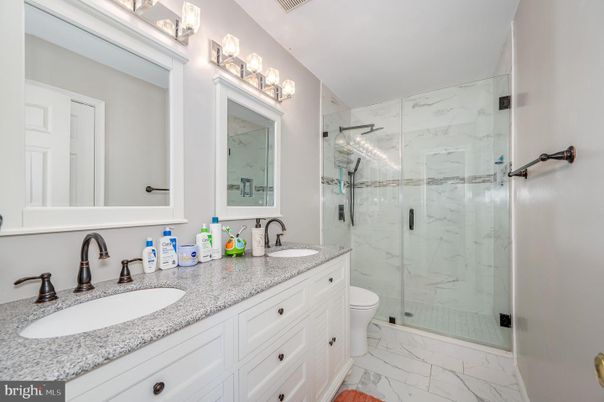 Bathroom, Dual Sink Vanities, Glass Shower, Interior, Marble, Marble Walls