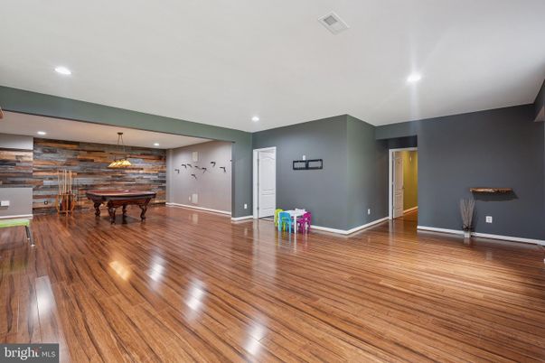 Billiard Table, Game Room, Interior, Pendant Lights, Recessed Lighting, Stone Walls, Wood Texture Flooring