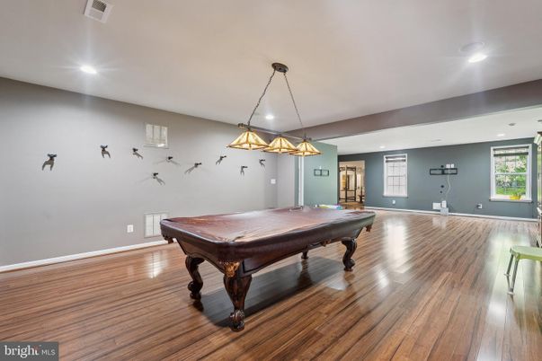 Billiard Table, Chandelier, Game Room, Interior, Pendant Lights, Recessed Lighting, Wood Texture Flooring