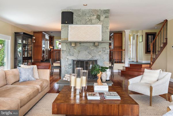 Fireplace, Interior, Living room, Recessed Lighting, Stone Walls, Wood Texture Flooring