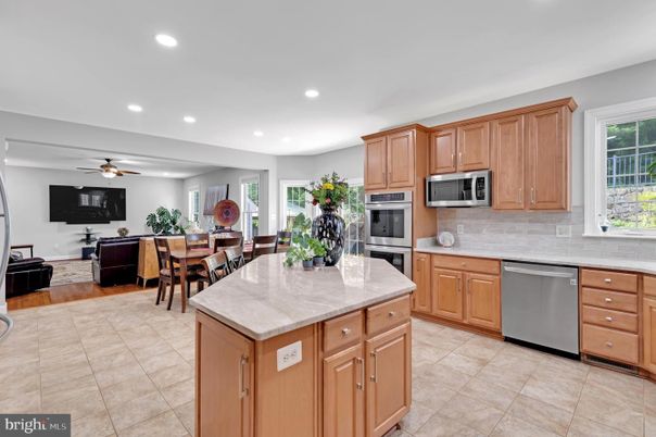 Dining room, Interior, Kitchen, Living room, Recessed Lighting, Stainless Steel Appliances, Wood Texture Flooring